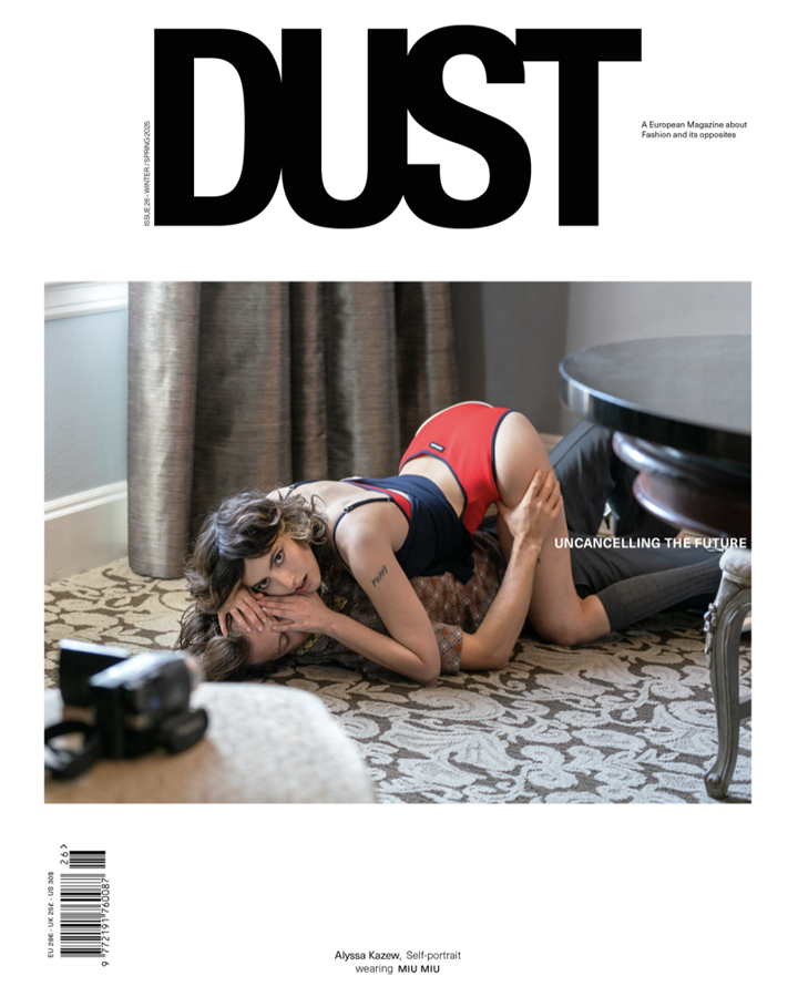 Dust Magazine Issue 26 cover layout with image of Alyssa Kazew laying seductively over a man with a video camera facing her on a nearby chair.